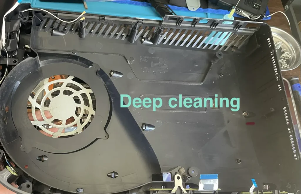 Game console opened for a deep cleaning