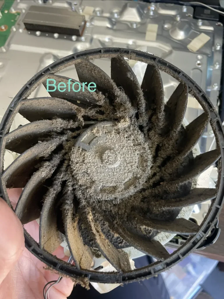 Dusty game console fan before cleaning