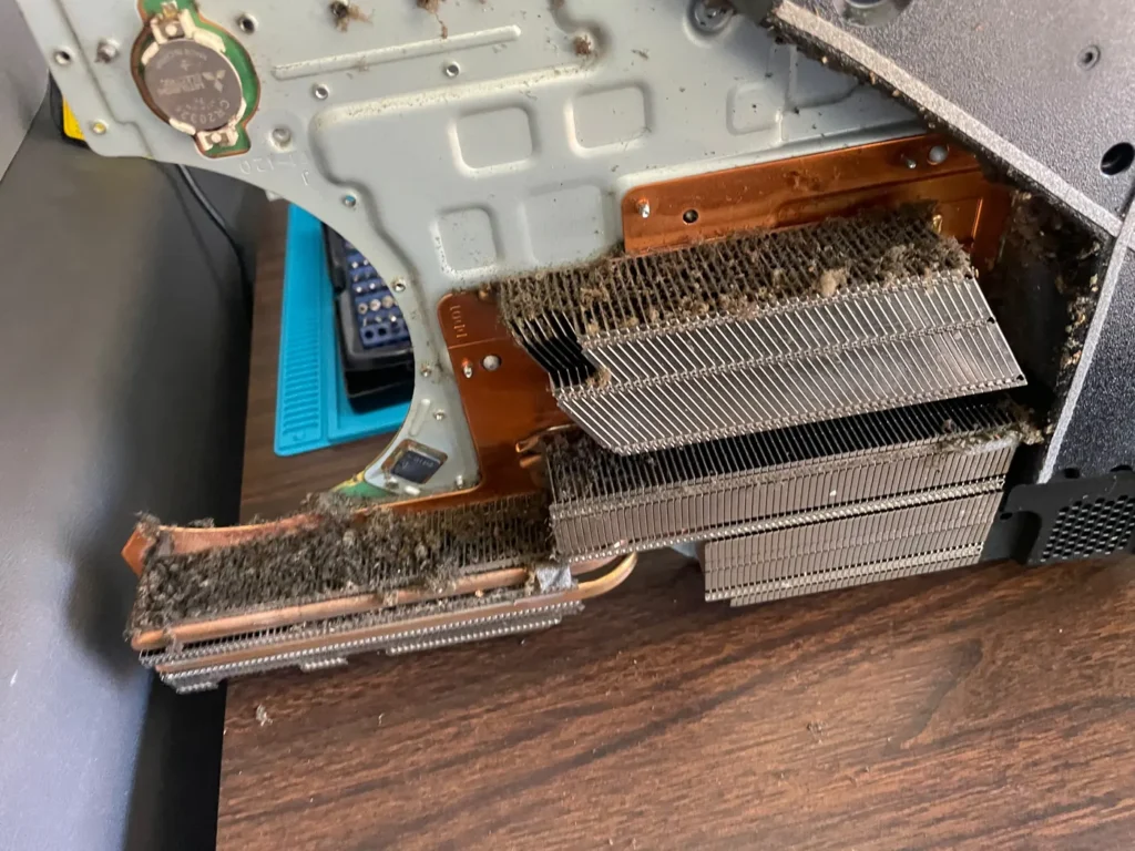 Heatsink and copper heat pipes removed during a repair