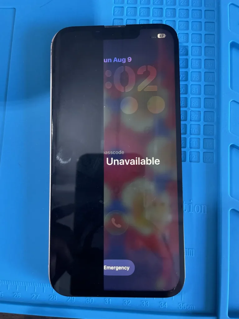 iPhone showing an unavailable lock screen on the repair bench