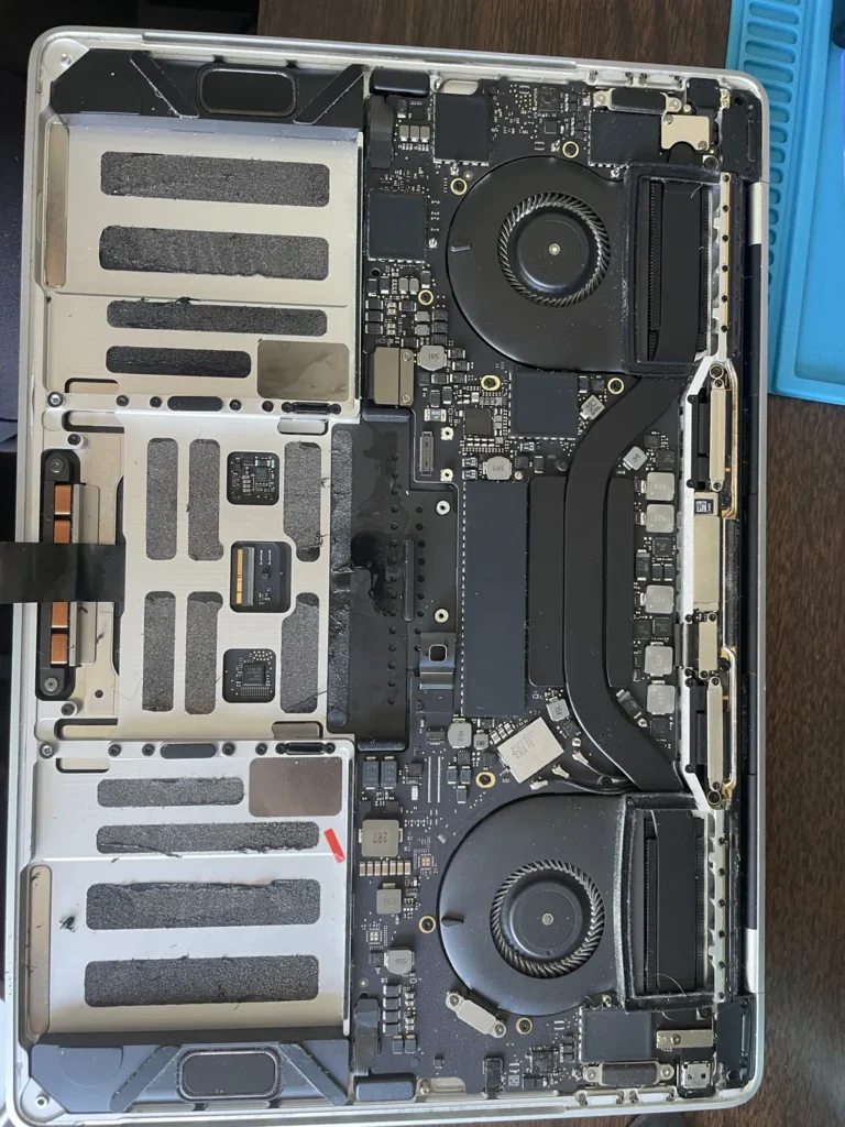 Laptop opened up for battery and board work
