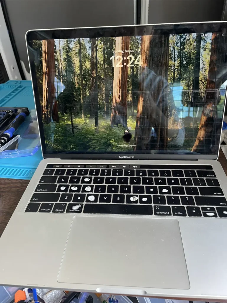 MacBook on the bench after a repair